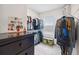 Walk-in closet with ample shelving, hanging space, and a window for natural light at 30845 Penny Surf Loop, Wesley Chapel, FL 33545
