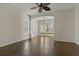 Bright bonus room featuring a bay window nook and a ceiling fan at 370 Tall Oak Trl, Tarpon Springs, FL 34688