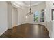 Elegant dining room showcases hardwood floors and a built-in display shelf at 370 Tall Oak Trl, Tarpon Springs, FL 34688