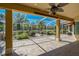 A large screened-in patio with beautiful landscaping can be seen outside, creating a relaxing outdoor space at 370 Tall Oak Trl, Tarpon Springs, FL 34688