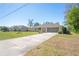 Charming one-story home with a well-maintained lawn and extended driveway at 4615 Elwood Rd, Spring Hill, FL 34609