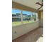 Spacious room showcasing large windows, letting in natural light overlooking the exterior at 4712 Marine Pkwy # 104, New Port Richey, FL 34652