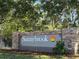 Welcome to Sunnybrook, a charming community with a beautifully designed entrance sign at 4925 Myrtle Oak Dr # 22, New Port Richey, FL 34653