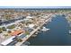 Waterfront community with canal access, showcasing homes with private docks and stunning views of the open water at 5000 Galleon Ct, New Port Richey, FL 34652
