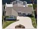 Aerial view of a single Gathering home with a large driveway and a backyard pool at 5000 Galleon Ct, New Port Richey, FL 34652