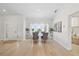 Bright dining room with a modern table set and view of the water at 5000 Galleon Ct, New Port Richey, FL 34652