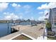 Waterfront home with a private dock, boat lift, and serene water views, perfect for enjoying the coastal lifestyle at 5000 Galleon Ct, New Port Richey, FL 34652