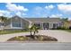 Charming single-story home with a well-maintained front yard and a circular driveway at 5000 Galleon Ct, New Port Richey, FL 34652