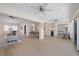 Open-concept living space with modern kitchen and cozy seating area at 5000 Galleon Ct, New Port Richey, FL 34652