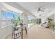 Inviting living area with water views, modern furniture, and an abundance of natural light at 5000 Galleon Ct, New Port Richey, FL 34652
