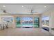 Bright sunroom with access to the pool and outdoor area at 5000 Galleon Ct, New Port Richey, FL 34652