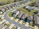 A high-angle shot of homes reveals modern roof designs, driveways, and neighborhood planning, giving insight into property layout at 5388 Fez Ct, Brooksville, FL 34602