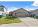 Charming single-Gathering home with a well-maintained lawn and attached two-car garage at 5388 Fez Ct, Brooksville, FL 34602