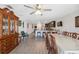 Open-concept living space showing dining room, kitchen, and connecting hallway at 5388 Fez Ct, Brooksville, FL 34602