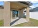 Covered patio area with concrete flooring, perfect for outdoor relaxation and entertaining at 5388 Fez Ct, Brooksville, FL 34602