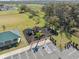 Aerial shot of community playground, showcasing recreation area, parking, and green space for Gathering enjoyment at 5388 Fez Ct, Brooksville, FL 34602
