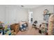 Cluttered room filled with boxes and personal items, showing ample storage space at 5388 Fez Ct, Brooksville, FL 34602