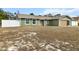 Inviting single-level home featuring green siding and a well-kept lawn in a desirable neighborhood at 5441 Alderwood St, Spring Hill, FL 34606