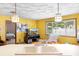 Living space with an open floor plan, open to kitchen, and lots of natural light at 5441 Alderwood St, Spring Hill, FL 34606