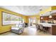 Living space with open floor plan with lots of natural light and access to porch at 5441 Alderwood St, Spring Hill, FL 34606