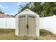 Durable backyard shed with double doors, ideal for secure storage and set against a clean, fenced yard at 5441 Alderwood St, Spring Hill, FL 34606