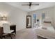 Bedroom with white walls, carpet, desk and natural lighting at 6259 Hillview Rd, Spring Hill, FL 34606