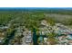 Aerial view showcases community with waterfront access, mature trees and serene environment at 6448 W Richard Dr, Weeki Wachee, FL 34607