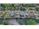 Aerial shot of house on water with docks and palm trees at 6448 W Richard Dr, Weeki Wachee, FL 34607