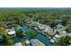 Aerial view of the waterfront homes, showcasing a unique layout with beautiful water views, neighborhood charm at 6448 W Richard Dr, Weeki Wachee, FL 34607
