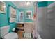 Bathroom features a toilet, vanity with sink, and a shower-tub combination at 6448 W Richard Dr, Weeki Wachee, FL 34607