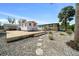 Exterior showcasing the front of the home, with a patio and lush landscaping at 6448 W Richard Dr, Weeki Wachee, FL 34607