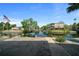 Waterfront view of canal homes with boat dock and boat ramp access to the water and American flag at 6448 W Richard Dr, Weeki Wachee, FL 34607
