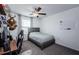 Bedroom with a single bed, desk, and deer mount on the wall at 6482 Beverly Hills Dr, Zephyrhills, FL 33541