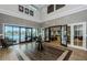 Spacious lobby featuring a high ceiling, elegant decor, and access to the pool area at 6482 Beverly Hills Dr, Zephyrhills, FL 33541