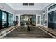Large lobby with hardwood floors, comfortable seating, and elegant interior design at 6482 Beverly Hills Dr, Zephyrhills, FL 33541