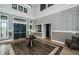 Attractive lobby featuring a high ceiling, hardwood floors, and elegant decor at 6482 Beverly Hills Dr, Zephyrhills, FL 33541