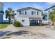 Elevated coastal home with waterfront access and ample parking underneath the house at 6503 Driftwood Dr, Hudson, FL 34667