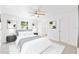 Main bedroom with neutral decor, a ceiling fan, and ample natural light at 7048 Oberon Ave, Spring Hill, FL 34608