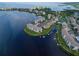Breathtaking aerial view of waterfront condominium with boat docks and lush landscaping at 8211 Brent St # 816, Port Richey, FL 34668