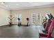 Bright fitness center with modern exercise equipment, including treadmills, and a weight machine at 8211 Brent St # 816, Port Richey, FL 34668