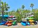 Kayak storage racks on a sunny day are full of colorful kayaks at 8211 Brent St # 816, Port Richey, FL 34668
