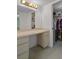Spacious vanity with ample storage, a large mirror, and great lighting at 8211 Brent St # 816, Port Richey, FL 34668