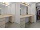 Spacious vanity with ample storage, a large mirror, and great lighting at 8211 Brent St # 816, Port Richey, FL 34668