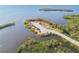 Overhead shot of community boat launch with parking, playground, and waterway access at 8721 Old Post Rd, Port Richey, FL 34668