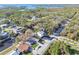 Beautiful aerial view of a coastal home with surrounding natural waterways and lush green landscape at 8721 Old Post Rd, Port Richey, FL 34668