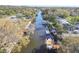 Picturesque canal view lined with homes, docks, and lush Florida foliage at 8721 Old Post Rd, Port Richey, FL 34668