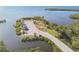Aerial view of the community's boat launch featuring a playground, parking and bay access at 8721 Old Post Rd, Port Richey, FL 34668