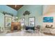 Cozy dining area with natural light, complemented by light wood floors and a decorative wooden ceiling at 8721 Old Post Rd, Port Richey, FL 34668