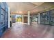 Large covered and gated garage, with view of the outdoors at 8721 Old Post Rd, Port Richey, FL 34668