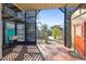 Outdoor space with a lattice enclosure, sink, and view of the backyard at 8721 Old Post Rd, Port Richey, FL 34668